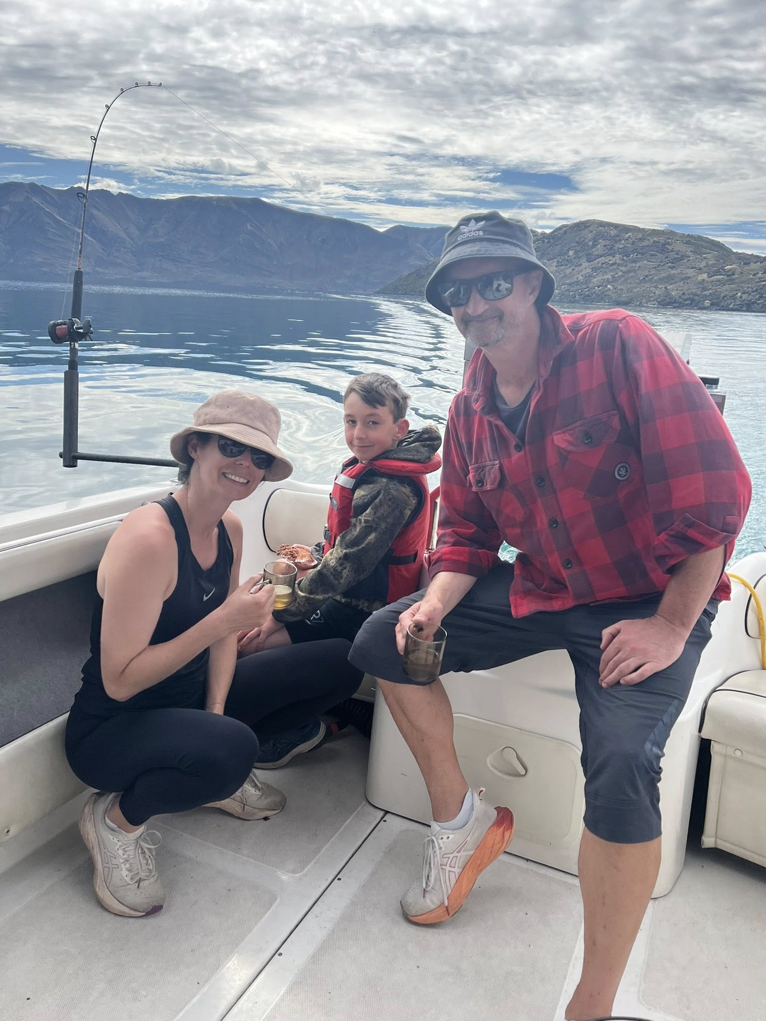 Family with young child on the boat, Lake Wanaka